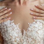 Pink manicure and neckline wedding dresses
